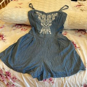 Hollister light denim color shorts romper, embroidered front.